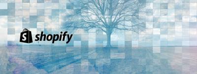 Shopify logo on an image of a tree