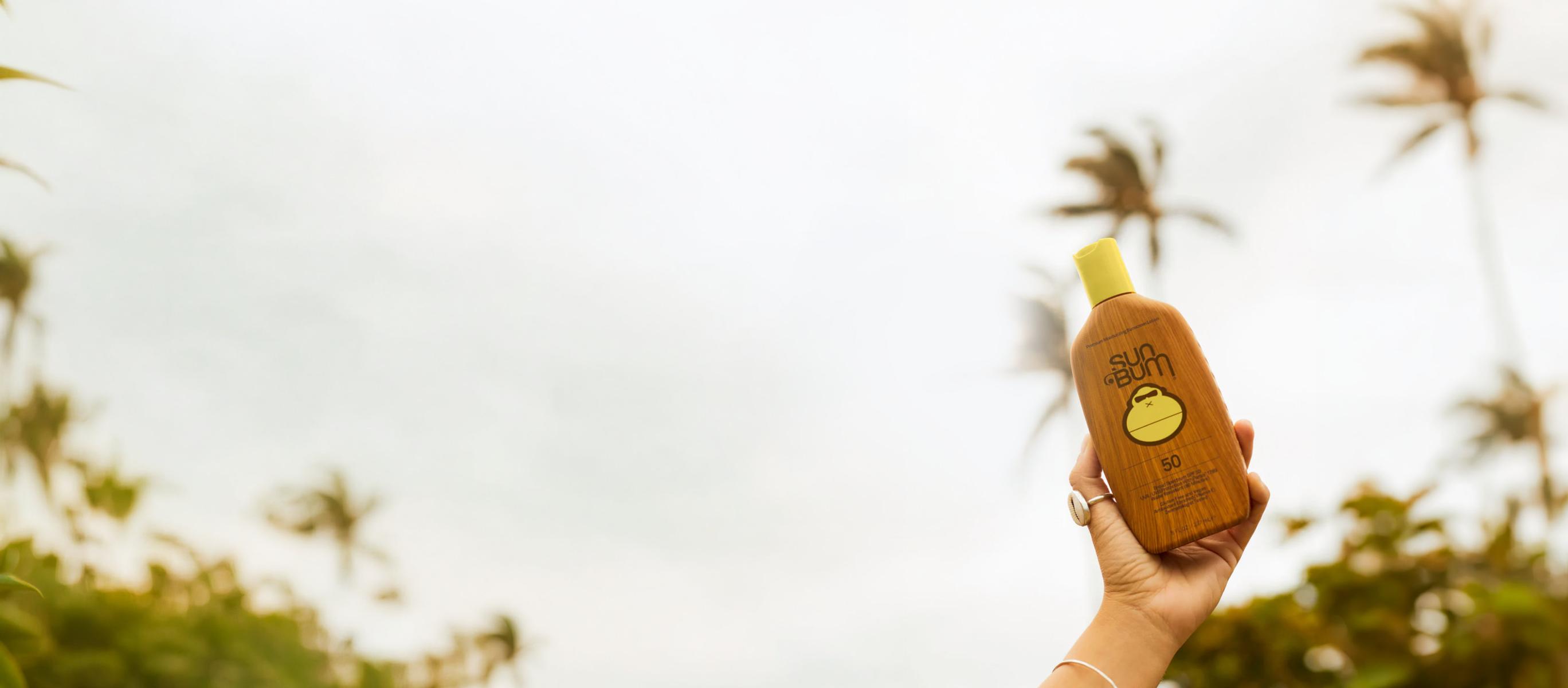 Applying Sun Bum sunscreen